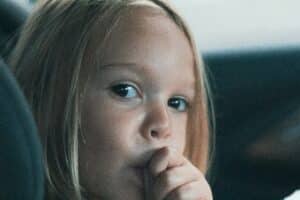 Is thumb sucking bad - child sucking thumb in car